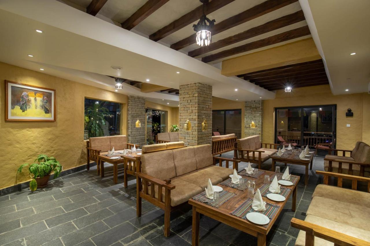 Bar Peepal Resort Покхара Экстерьер фото The restaurant at the resort
