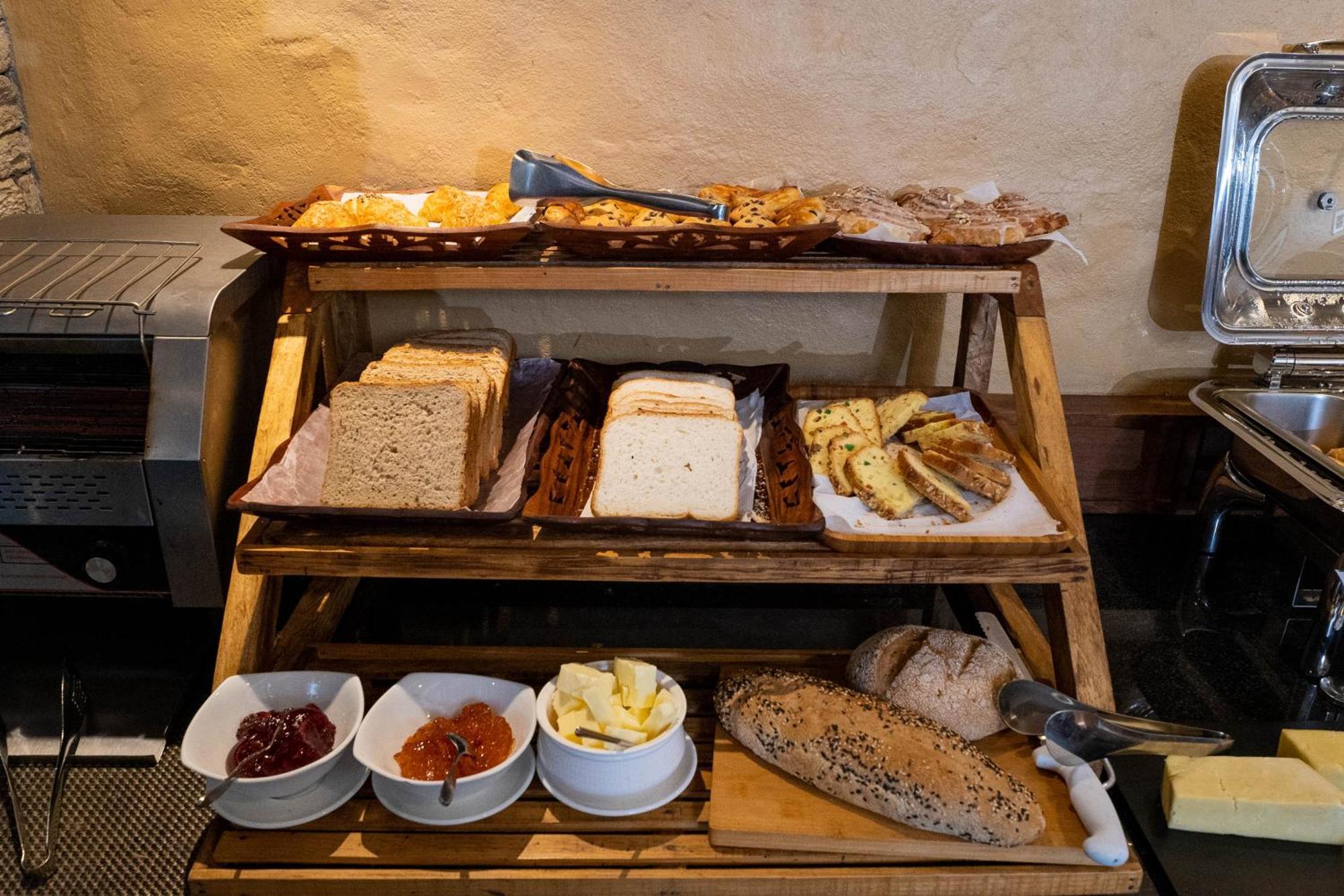 Bar Peepal Resort Покхара Экстерьер фото A selection of cheeses at a buffet