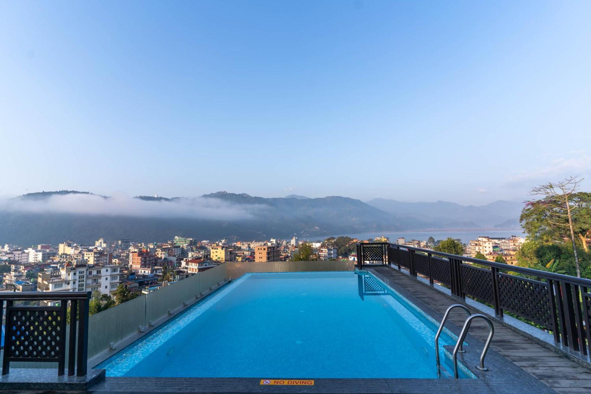 Bar Peepal Resort Покхара Экстерьер фото View of the city from the hotel