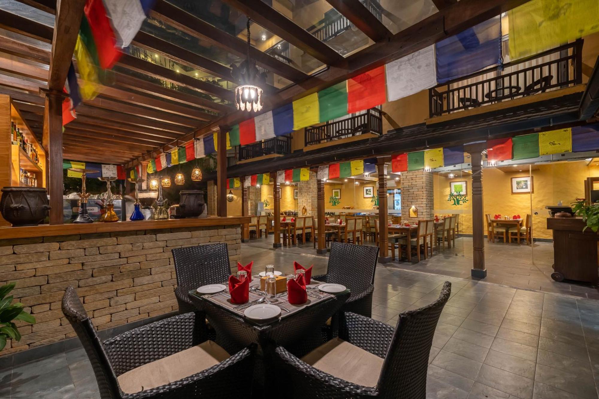 Bar Peepal Resort Покхара Экстерьер фото The interior of the restaurant
