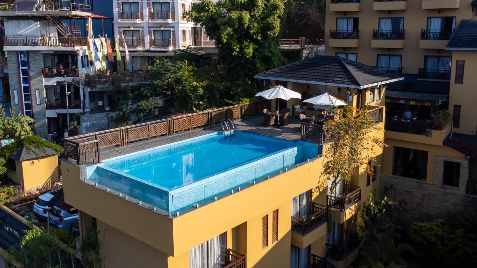 Bar Peepal Resort Покхара Экстерьер фото Rooftop pool at the Hotel